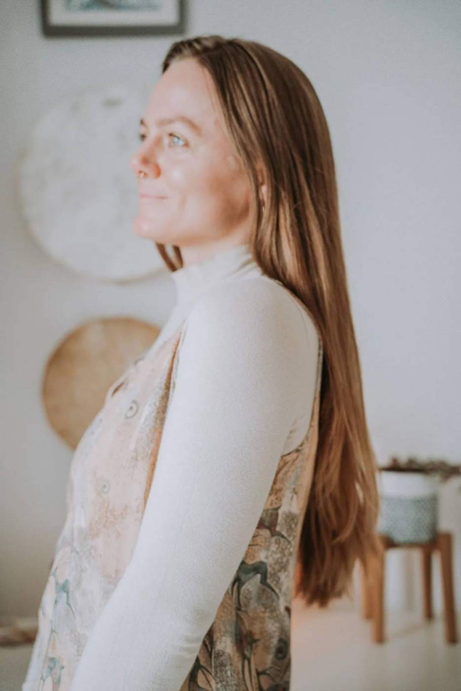 Cassandra in profile, long hair over her shoulder