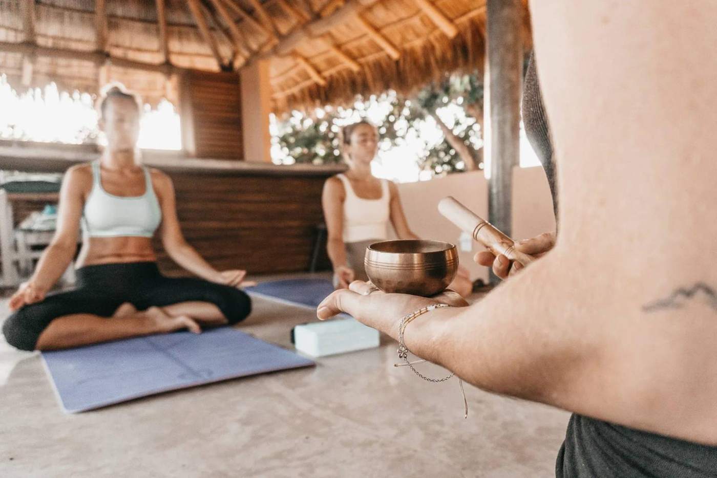 Yoga beneath a palapa at Yantara